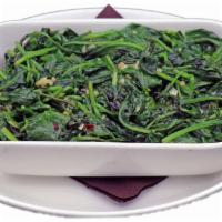SAUTEED BABY SPINACH · Slightly Wilted, Roasted Garlic Oil, Red Pepper Flakes 