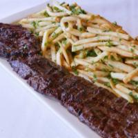 Skirtsteak app · 14 oz churrasco,  served with French Fries , and onions
Steak sauce and mob sauce