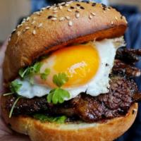 Mob Shortribs Burger · 6oz burger,  Cheddarcheese with  beefshortribs  , topped with  egg