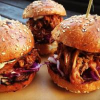 BBQ PULLED PORK SLIDERS · 3 bbq pulled pork slider 
With pickles onions and cheddar cheese
Served with fries 