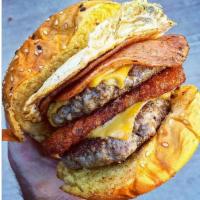 Good Ol' Jersey Burger · 2 hash brown patties in the middle topped with Taylor ham, American cheese and an over easy ...