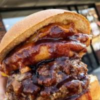 Bada Bing BBQ Stuffed Burger · Stuffed with bacon and cheddar cheese, topped with extra cheddar cheese and whiskey battered...