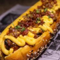 Donnie Brasco Dog · Favorite hot dog covered in American cheese, bacon and topped with chili. 