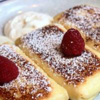 Nutella cheese blintzes  · 4 of them topped with , Nutella & fresh fruit