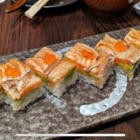 Salmon Oshizushi · Seared salmon, avocado, soy sauce and ikura. 7 pieces.