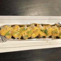 Scallop Lover Roll (Baked) · Imitation Crab and eel topped with baked scallop, spicy mayo sauce, eel sauce, sesame seed a...