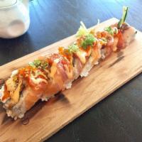 Juicy Roll · Imitation Crab, eel, avocado, and Cucumber topped with salmon, yellowtail, spicy tuna, tobik...