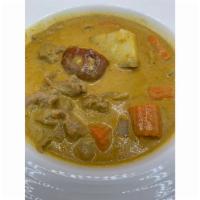 Yellow Curry แกงเหลือง · Turmeric spices paste and savory coconut-based curry with onions, carrots, potatoes and bell...