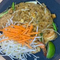 Pad Thai ผัดไทย · Traditonal stir-fried rice noodle dish with our authentic Pad Thai sauce mixed with egg, tof...