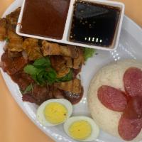 Khao Moo Krob + MooDang (Red BBQ Pork + Crispy Pork over rice) ข้าวหมูแดงกับหมูกรอบ · Crispy pork + Red BBQ Pork over rice with hard boiled egg and Chinese sausage top with red s...