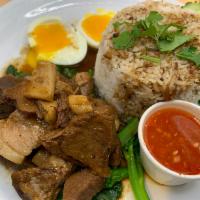 Khao Moo Toon ข้าวหมูตุ๋น · (Stew Pork over rice ) Sliced slow cooked stew pork , with black sweet soy sauce , Chinese b...