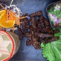Nuer Dad Diew(Thai Beef jerky)+sticky rice · Deep fried marinated beef come with sticky rice