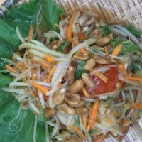 Papaya Salad Thai style (ส้มตำไทย)  · Som tum Thai. Thai style salad with papaya, chille, peanut, dry shrimp serve with sticky rice.
