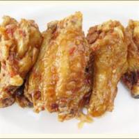 8. Dynamite Chicken Wings · Deep fried chicken wings glazed with Thai spicy and sweet sauce. Spicy.