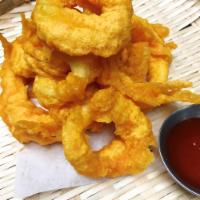 12. Fried Calamari · Lightly breaded calamari and crispy fried; served with sweet and sour sauce.