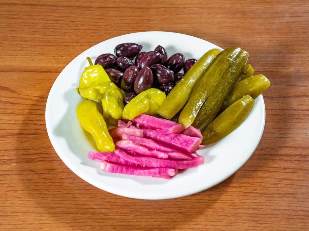 Pickled Mix · Pickled cucumbers, turnips, olive mix and pepperoncini marinated in lemon juice and olive oil.