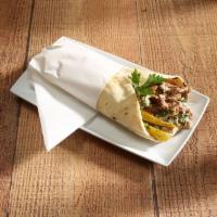 Chicken Shawarma Sandwich · Marinated thin slices of chicken breast seared to perfection. Topped with garlic sauce, pick...