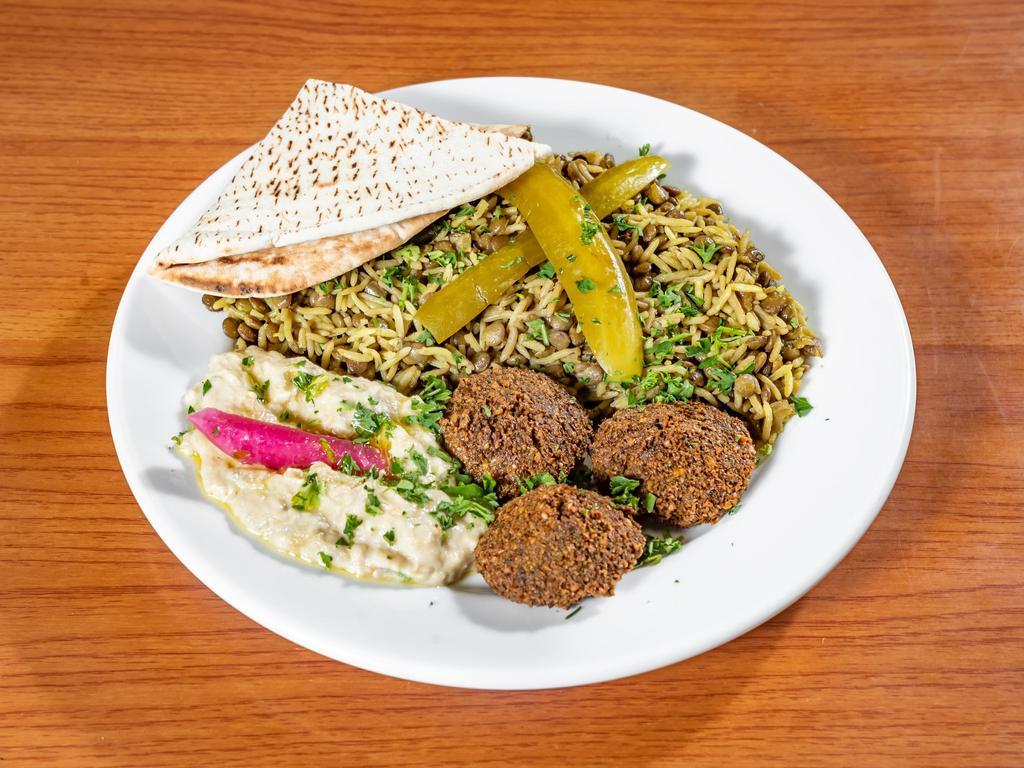 Jordanian Vegetarian Plate · M'jadara, baba ghanoush, and 3 falafels. Garnished with pickles and turnips. Served with a warm pita.