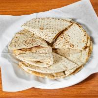 Side Pita Bread · Round unleavened flatbread. 