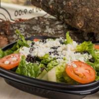 Greek Side Salad · Romaine lettuce, Roma tomatoes, feta cheese, black olives, red onions, served with balsamic ...