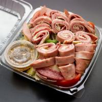 Antipasto Salad · Our traditional garden salad topped with sliced Italian cold cuts including Genoa salami, mo...