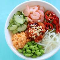 Dynamite Bowl · Spicy ahi, shrimp, spicy crab, jalapenos, cucumber, dynamite sauce, and tempura crunchies.