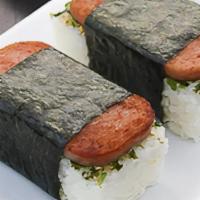 Spam Masubi · A Hawaiian classic. Grilled spam atop rice wrapped in seaweed.