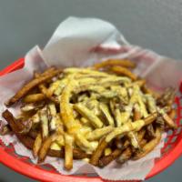Cheddar Cheese Fries · Deep fried; salted potatoes topped with melted cheddar cheese.