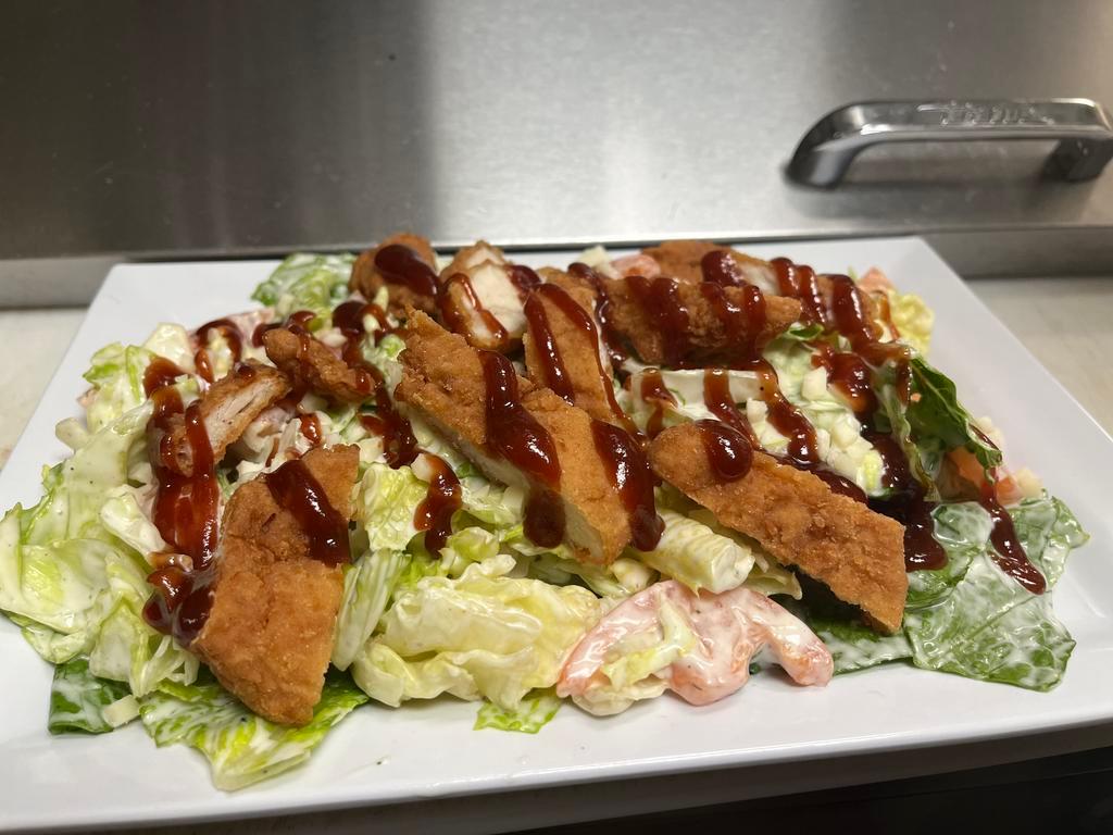 Southwest BBQ Chicken Salad · Mixture of Romaine and Iceberg lettuce, crispy chicken, tomatoes, mozzarella cheese, BBQ sauce & ranch dressing.