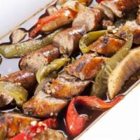 Sausage, Pepper and Potato Platter Dinner · Homemade grilled Italian sausage sauteed in a white wine sauce with potatoes, green peppers,...