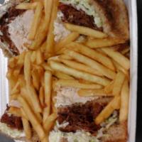 Triple Decker Turkey Club · Oven Roasted Turkey, bacon, American cheese, mayo, lettuce, tomato on 3 slices of toast. Com...