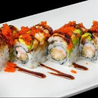 Dragon Maki · Shrimp tempura and crab stick with eel, avocado and tobiko on top. Cooked.