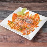 Carpaccio di Salmone · Smoked salmon, lemon juice, fennel and Dijon honey mustard sauce.