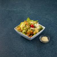 Caesar Salad · Romaine lettuce, Parmigiano cheese, croutons and homemade Caesar dressing.