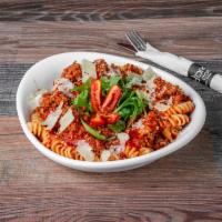 Fusilli Bolognese · Ground beef, fresh tomato sauce and Parmesan cheese.