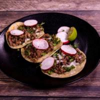 3 Tacos · Corn tortilla with choice of meat, cilantro, and onion.