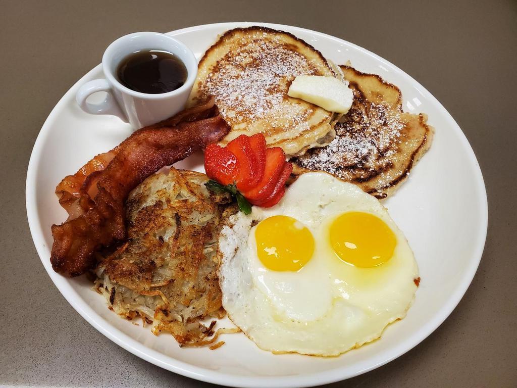 Pancake Combo · two buttermilk pancakes served with two eggs, your choice meat, and hashbrown