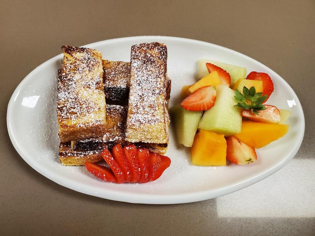 Fruit French Toast · French toast, strawberries, and bananas