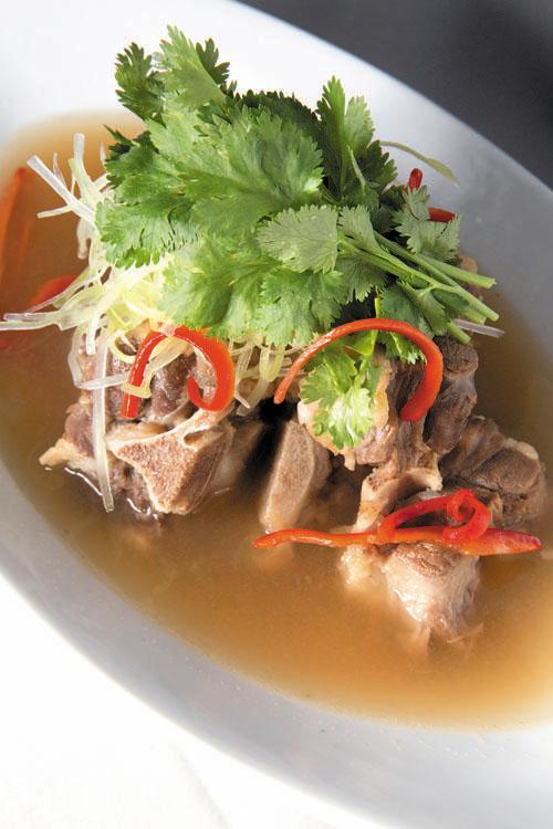Thai-Style Oxtail Soup · Served with spicy lemongrass broth and Chinese celery. Rich beef broth like no other. Full-flavored. A must-try for oxtail soup lovers. Served with steamed white rice or steamed coconut milk ginger brown rice.