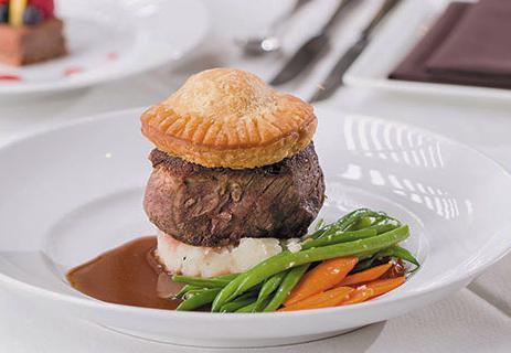 Grilled Filet Mignon · Served with mashed potato, mushroom puff, Merlot demi, haricot vert, baby carrot and sun-dried tomato.
