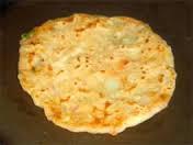 Onion Naan · Tandoori fried white flour bread.