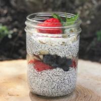 Chia Pudding Parfait · Flavored with vanilla and maple syrup and layered with fresh berries, pears, toasted coconut...