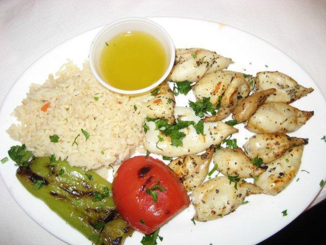 Grilled Calamari · Served with rice and grilled vegetables.