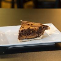 Chocolate Peanut Butter Chess Pie Slice · Chocolate and peanut butter. Served cold with heating directions.