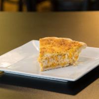 Crab and Cheddar Quiche Slice · Fresh lump crab meat with sharp cheddar cheese and a healthy sprinkling of Old Bay. Delivere...