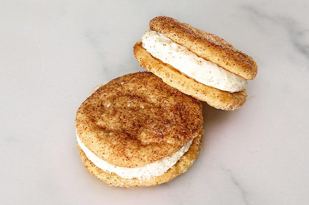 Cinnabon® Mini Cookie Sandwiches – 2ct · Cinnabon® signature frosting sandwiched between 2 mini snickerdoodle-style cookies made with Cinnabon’s famous Makara Cinnamon. Served as 2ct. 