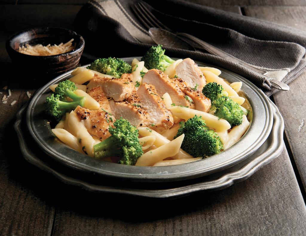 Chicken & Broccoli Pasta · Seasoned chicken and fresh broccoli over penne pasta in Parmesan cream. Served with 4 Breadsticks.