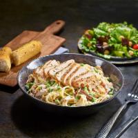 NEW Chicken Carbonara · Grilled chicken served atop fettuccine tossed with alfredo sauce, bacon, peas, roasted baby ...