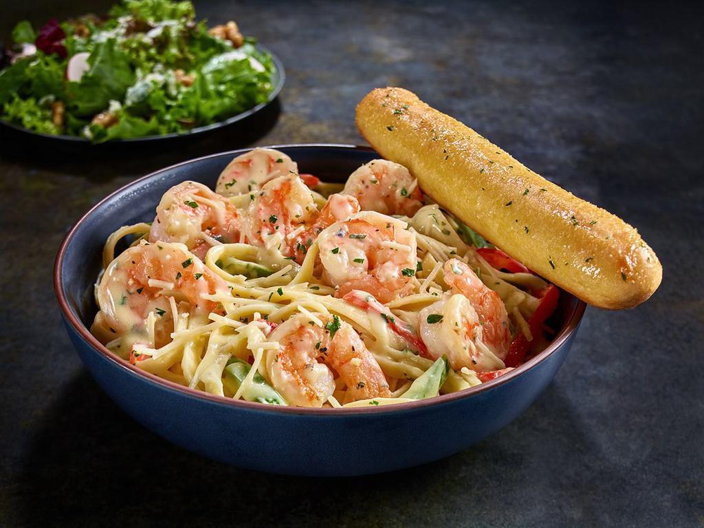 NEW Shrimp Scampi Pasta · Broiled shrimp in garlic white wine sauce, served over fettuccine with peppers and signature lemon butter sauce.