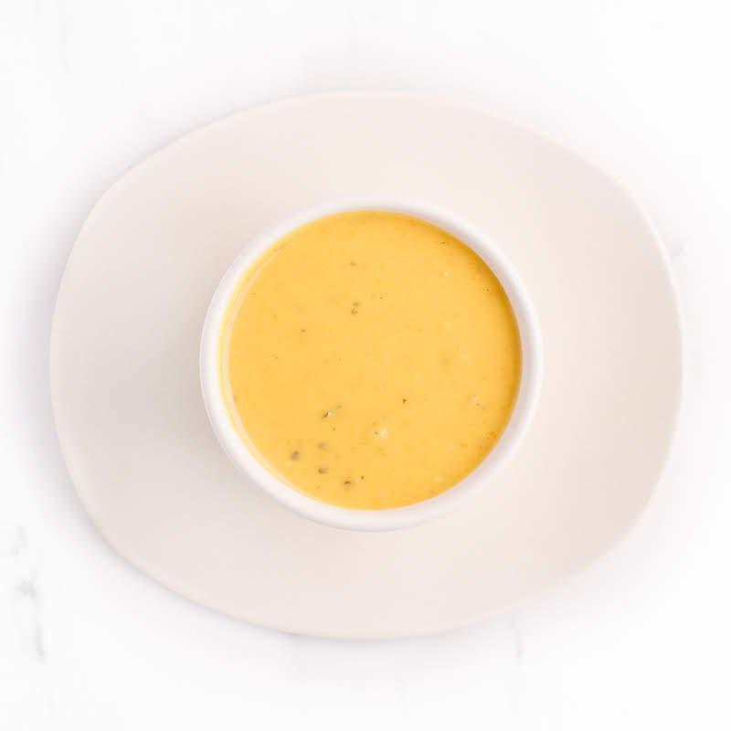 Curry Sweet Potato · crafted from coconut milk, real sweet potatoes, and authentic Thai yellow curry, this rich and warmly spiced soup is perfect on a cold day
